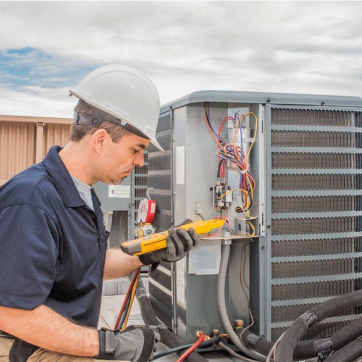 Durham Heating & Cooling HVAC technician on a service call in Durham, Ontario